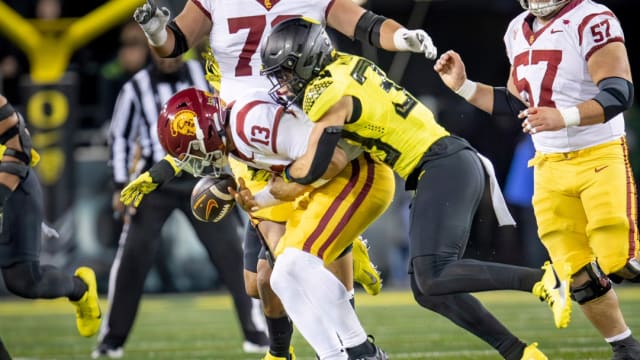USC quarterback Caleb Williams is sacked.